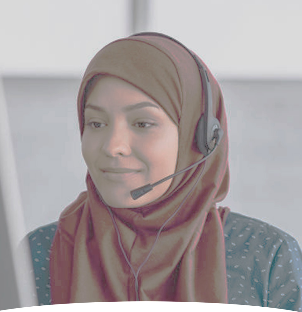 woman in a call center considering calling a religious discrimination attorney in los angeles, california